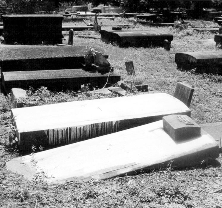 Broken crypts and vaults are shown at Sweet Olive Cemetery located off N. 22nd St. in Baton Rouge. Photo by Willie Siglar II/DIGEST