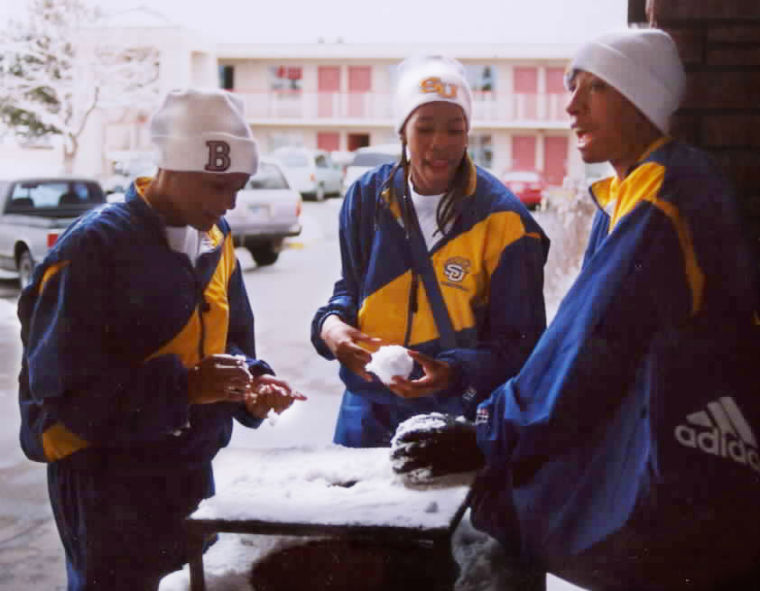 Sophomore forward Tiffany Womack, junior forward Ruth Buck and Tammy Bullock plan a snowball ambush on the team's coaches in Boulder, Colo. Photo by Brandi Jade Thomas/DIGEST