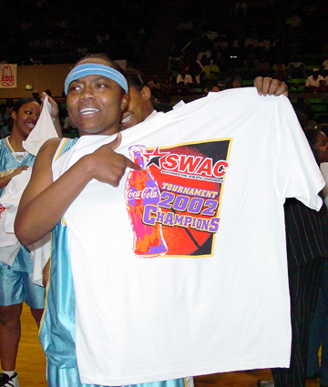 Tiffany Womack holds up the 2002 SWAC Championship T-Shirt that went to her Southern University Jaguars who are headed to the NCAA West Regionals to face the No. 3 seeded Colorado Buffalos. SU enters as the No. 14 seed. Photo by Nikki Bannister/DIGEST