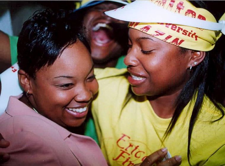 An elated Erica Walton (left) rejoices with supporters after being named the 2002-03 Miss Southern University. Walton, a native of Belzoni, Miss., defeated LaTroya Foster 941-620 in a run-off. - Photo by Brandi Jade Thomas/DIGEST