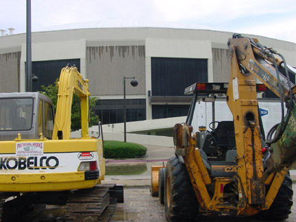 Bulldozers parked in front of the F.G. Clark Activity Center on a day of rain which halted the continued renovations of the "Mini-Dome." Photo by Ryan P. Knight/DIGEST