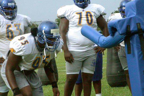 Brian Young, (#95) a University of Tennessee transfer, at defensive end, will solidify an already strong defensive unit for the Jaguars. SU will feature a new look in the 2002 season, donning the solid blue helmets this year. - Photo by Willie Siglar II