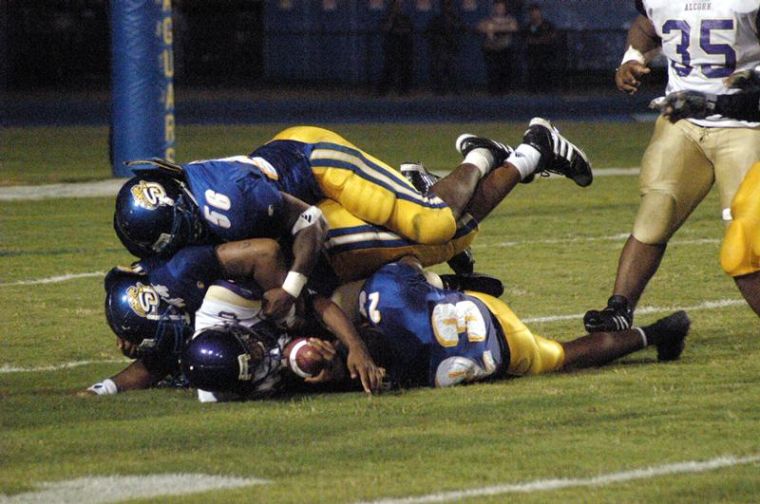 Jaguar defense pile up on a Alcorn State back - Photo by Ryan Kinght/DIGEST.