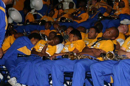 The Southern University Band sleeps while being bored by the sounds coming from the Grambling State band. - Photo by Kivoli Thomas/DIGEST