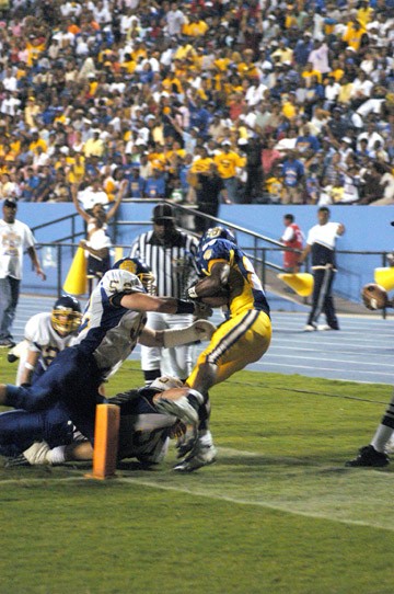 Jags' sophomore wide receiver Antonio Overstreet is pushed out of bounds before breaking the plane. - PHOTO BY RYAN P. KNIGHT//DIGEST