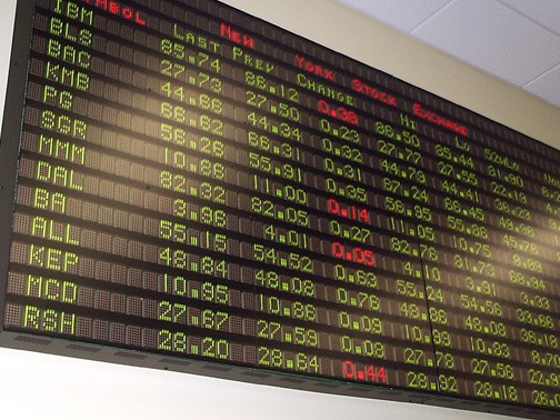 Abbreviated stock quotes from the New York stock exchange are displayed daily. - PHOTO BY AUDREY MASSENBURG//DIGEST