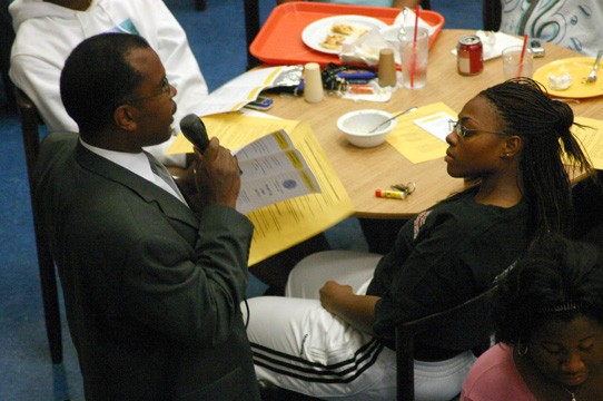 Freshman psychology major Courtney Young listens as SUPD Chief Dale Flowers discuss campus safety. - PHOTO BY DOUGLAS TOUSSAINT//DIGEST