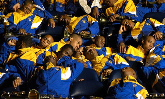 The Human Jukebox band members are lulled to sleep as the GSU Tiger marching band plays a selection at Friday's Battle of the Bands.