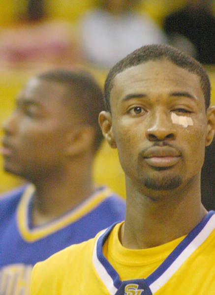 Southern University guard Chris Alexander shows the effects of being "sucker punched" in the first half of the Jaguars 66-65 victory over Jackson State Monday night. Alexander was hit by JSU's Charlie White - Photo by Josh Halley // The Southern DIGEST