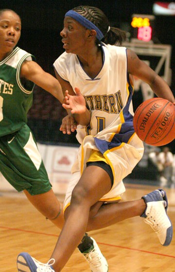 Southern University guard Rolonda Monroe, the SWAC Player of the Year, drives hard to the basket to score two of her 26 points against Mississippi Valley as the Jaguars advance to the semifinals against Alabama State on Friday at 10 a.m. at the BJCC. The