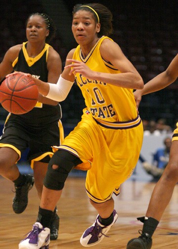 Alcorn State Lady Braves guard LaToya Johnson drives hard to the basket to score two of her 18 points in Friday's 59-50 semifinal victory over the Lady Tigers of Grabmbling State. With this win the Lady Braves advance to the SWAC Championship game Saturda