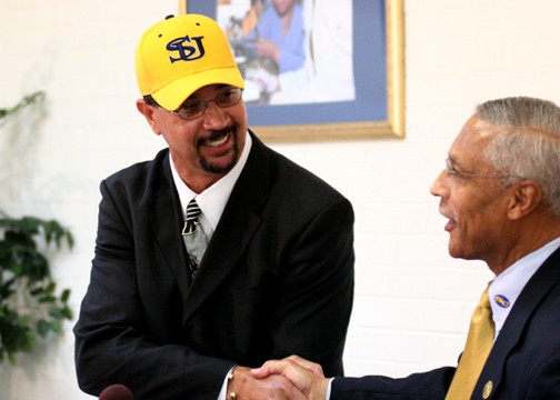 Southern University Chancellor Dr. Edward Jackson welcomes Rob Spivery as the new men's basketball head coach at Southern during Thursday's press conference. Spivery, who served as the head coach at SWAC rival Alabama State for nine seasons, becomes South