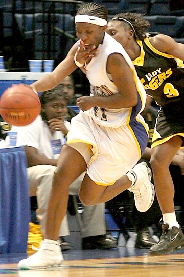 SWAC Player of the year and Jaguars' senior guard Rolonda Monroe is fouled near the end of the Jaguars' 84-76 victory over the Grambling State Lady Tigers Wednesday night. Despite sitting on the bench for most of the first half because of two early fouls,