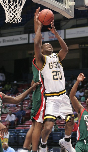 Grambling State junior forward Anthony Williams struggles to get a lay up off after driving the baseline. (PHOTO BY JOSHUA L. HALLEY)