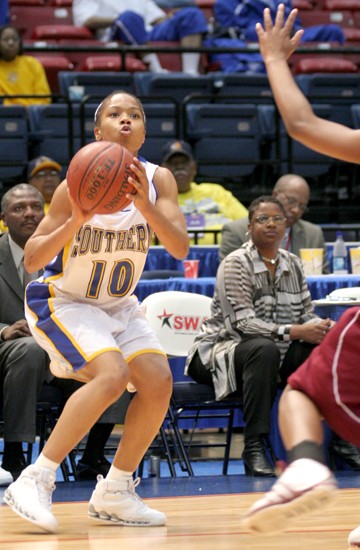 Jaguars' senior guard Ciara Shiggs sqaures up for three-point attempt in the Jaguars' 58-55 OT victory of the AAMU Bulldogs. Shiggs hit two crucial free throws to seal the Jaguars' bid to the SWAC Championship game, for the fourth consecutive time. The Ja