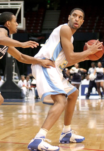 Southern University junior guard DeForrest Riley-Smith eyes the post for an open teammate. Riley-Smith added 13 points to the Jaguars' 66 total points. (PHOTO BY JOSHUA L. HALLEY)