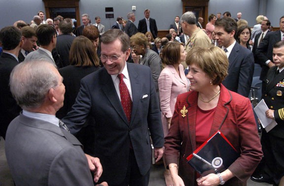 Senate President Don Hines, D-Bunkie, left, greets Michael Leavitt, U.S. secretary of Health and Human Services, center, Tuesday April 25, before he and Gov. Kathleen Blanco address the Joint Health &amp; Welfare Committee, in Baton Rouge, La. Leavitt spoke o