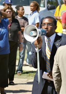 SGA President Niiobli Armah tries to rally students sitting in front of T.T. Allain Hall during the Student Violence Awarness March on September 20. Armah and other student leaders organized the march in response to a shooting across the street from campus during a football game in early September.
