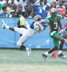 Southern defensive back Glenn Bell intercept a pass intended for FAMU wide receiver Willie Hayard preventing a touchdown.