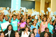 Students gather to show support for their favorite candidate at the "pep rally" style SGA debate on Tuesday night in the Cotillion Ball Room.