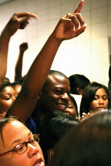 celebrates after forcing a runoff against Stanley White for SGA President Monday in the Union.