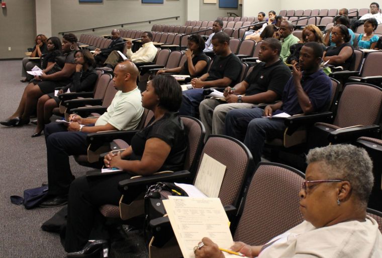 The audience shows great intrigue in response to Ms. Sharon Carter, one of the speakers for the AWS hosted "I Love the Way You Lie" domestic abuse forum on Tuesday, September 21 in T.T. Allain in room 313.