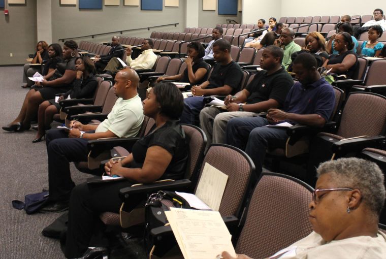 The audience listens attentively to Mrs. Sharen Carter, one of the speakers for the " I Love the Way You Lie" domestic abuse program on Tuesday, September 21 in T.T. Allain room 213.