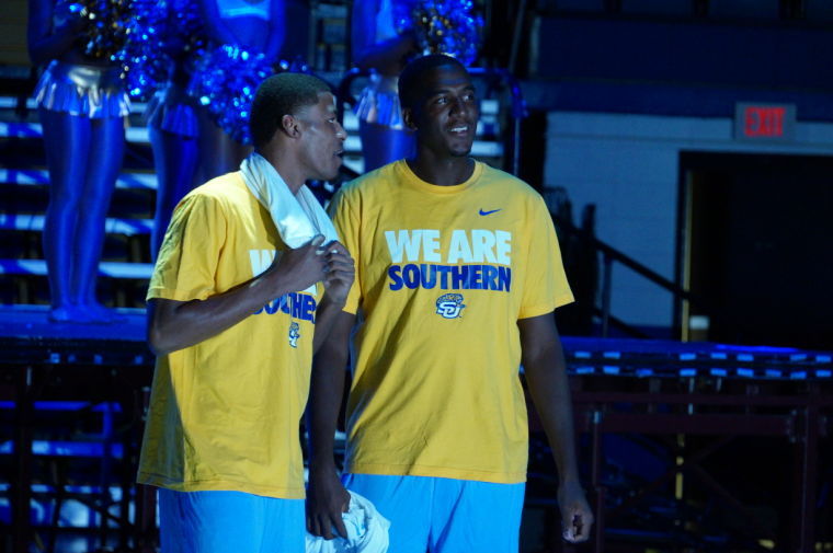 Guard Malcolm Miller and Center Javan Mitchell talk to each other during Sunday night's Jaguar Pandemonium at the F.G. Clark Activity Center&#160;