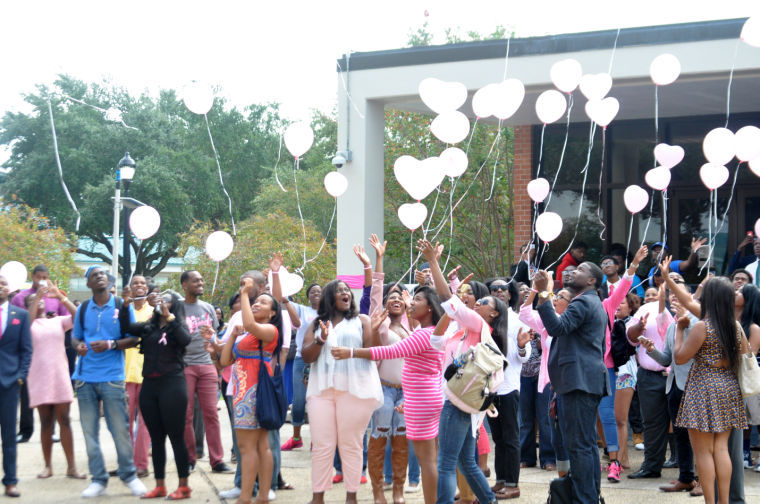 Students particpated in balloon realease Wednesday at noon to celebrate breast cancer awareness month in front Smith-Brown Memorial Union.