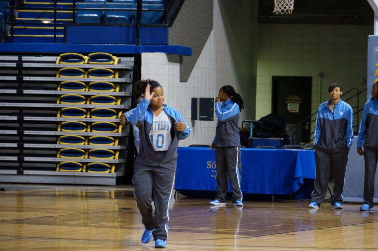 Sophomore guard Jasmine King waves at the crowed after being introduce at the Jaguar Pandemonium Sunday at the F.G. Clark Activity Center