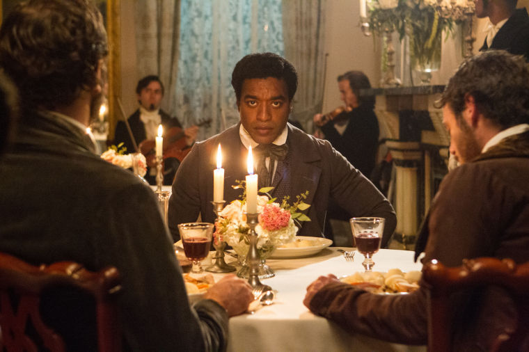 This image released by Fox Searchlight shows Chiwetel Ejiofor in a scene from "12 Years A Slave." (AP Photo/Fox Searchlight, Jaap Buitendijk)