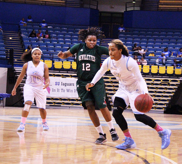 Sophomore Jasmine King looks on as SU Senior Guard Yasmin Fuller blows by a Mississippi Valley State defender during the SU vs. MVSU game on Monday, February 17, 2014 in F.G. Clark Activiy Center.&#160;
&#160;