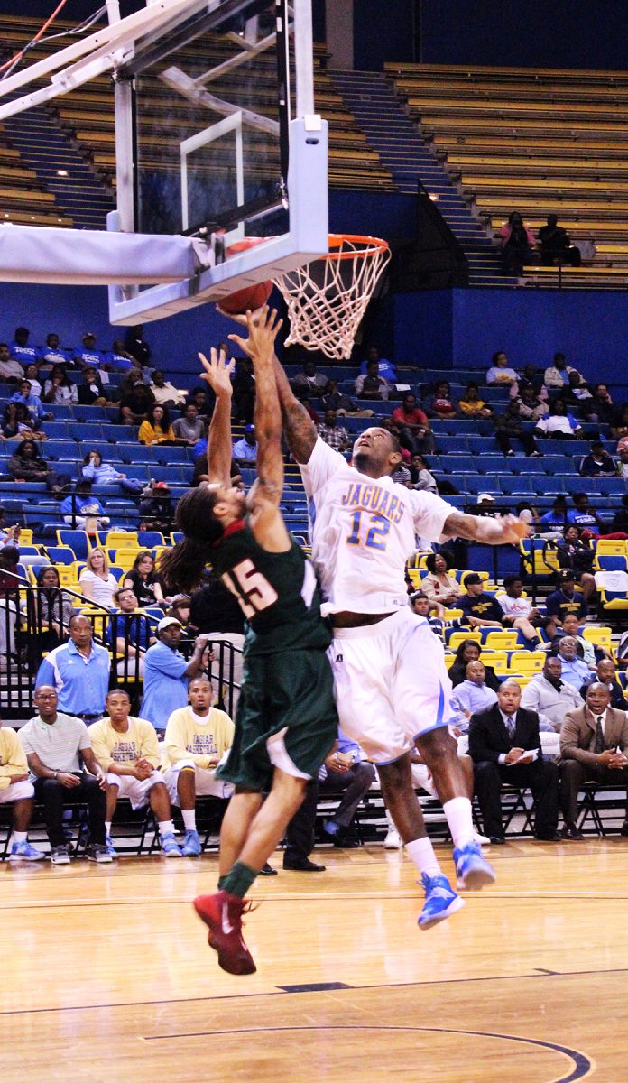 Senior forward Bryce Clark scores a basket over a Mississippi Valley State defender in the end of the 2nd half.&#160;&#160;