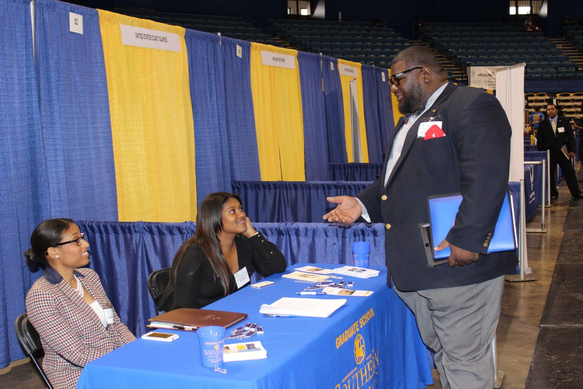 John Dorsey, a senior accounting major from Baton Rouge, speaks with two of Southern's graduate students, LaJarde Johnson, a first year grad student from baton rouge and &#160;Biana Growe, a second year grad student Lafayette about the master degree programs Southern University offers. &#160;