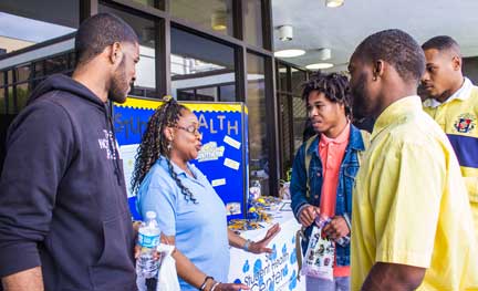 Director of Student Health Shirley Wade talks to students during the 1st Annual LCHE&#160; Health Crusaders Health Fair.
&#160;