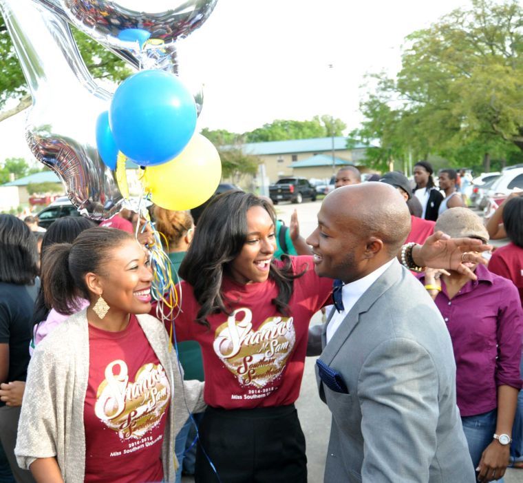 Nicholas Harris, the newly elected SGA President and Shanice Sam (middle), the newly elected Miss Southern celebrate their victorys outside of the Smith Brown Memorial Student Union on April 7, 2014.
&#160;