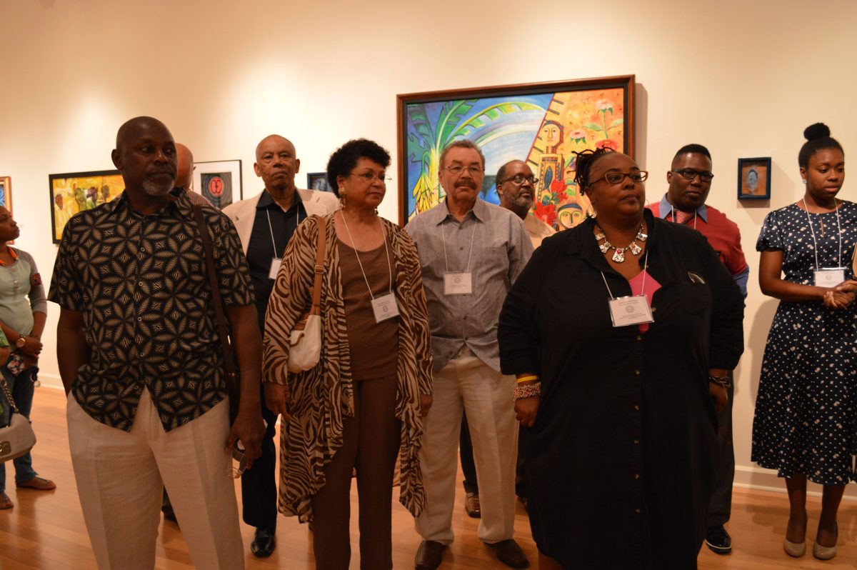 Southern University students, faculty, and others gather at the centennial artshow to admire artwork of national known artist.&#160;