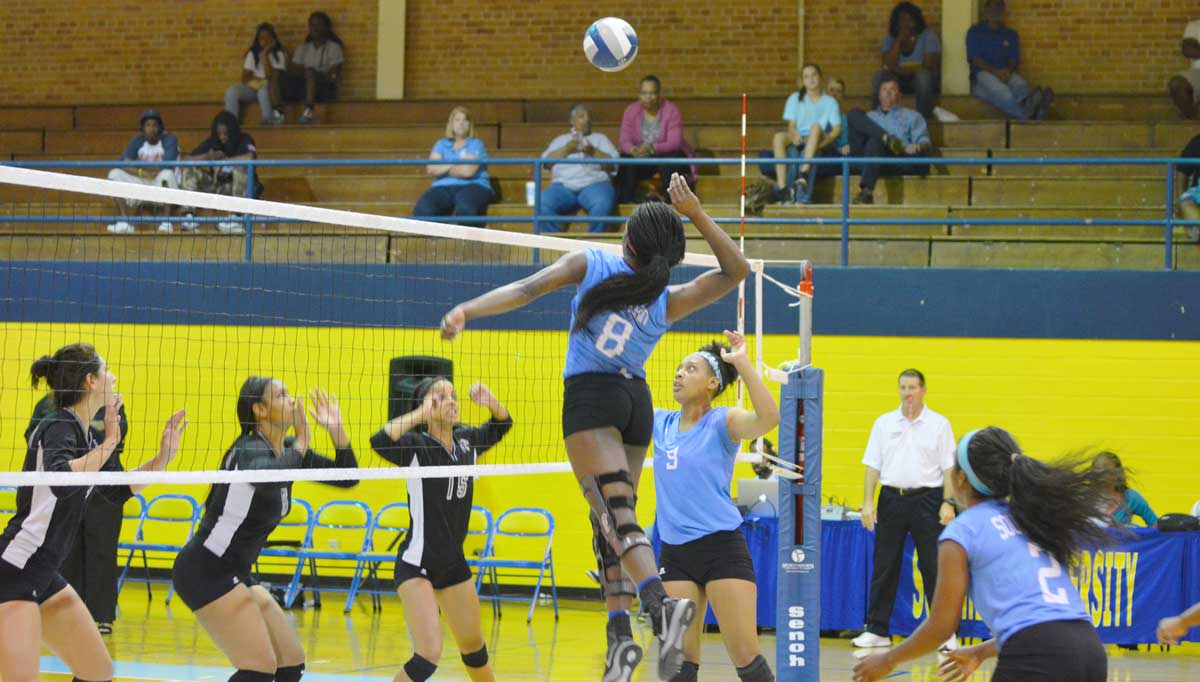 <p>Junior middle blocker, Chinasa Ekweairiri sets back to kill the ball into Prairie View A&M territory at Clifford Seymour Gym on October 7, 2014.</p>