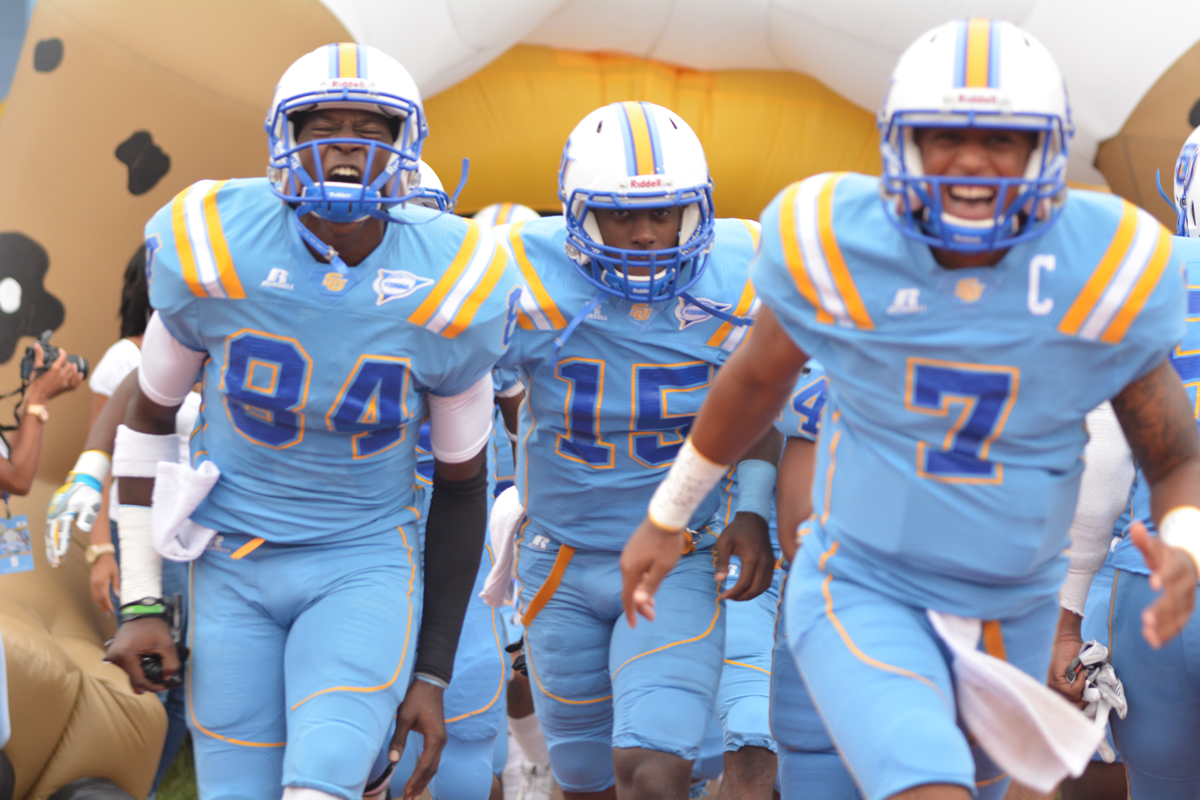 Members of the Jaguar football team storm onto the field in anticipation to capture a centennial homecoming victory. The Jaguars defeated UAPB in front of a sold out crowd this past Saturday at A.W. Mumford Stadium.&#160;