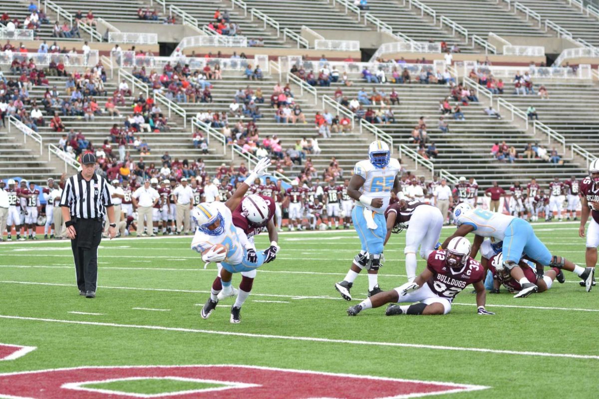 Redshirt sophomore, Lenard Tillery, sails into the endzone as he completes the run for a touchdown. Tillery rushed for two touchdowns and gained 94 yards against the strengthened Alabama A&amp;M defense.&#160;
&#160;