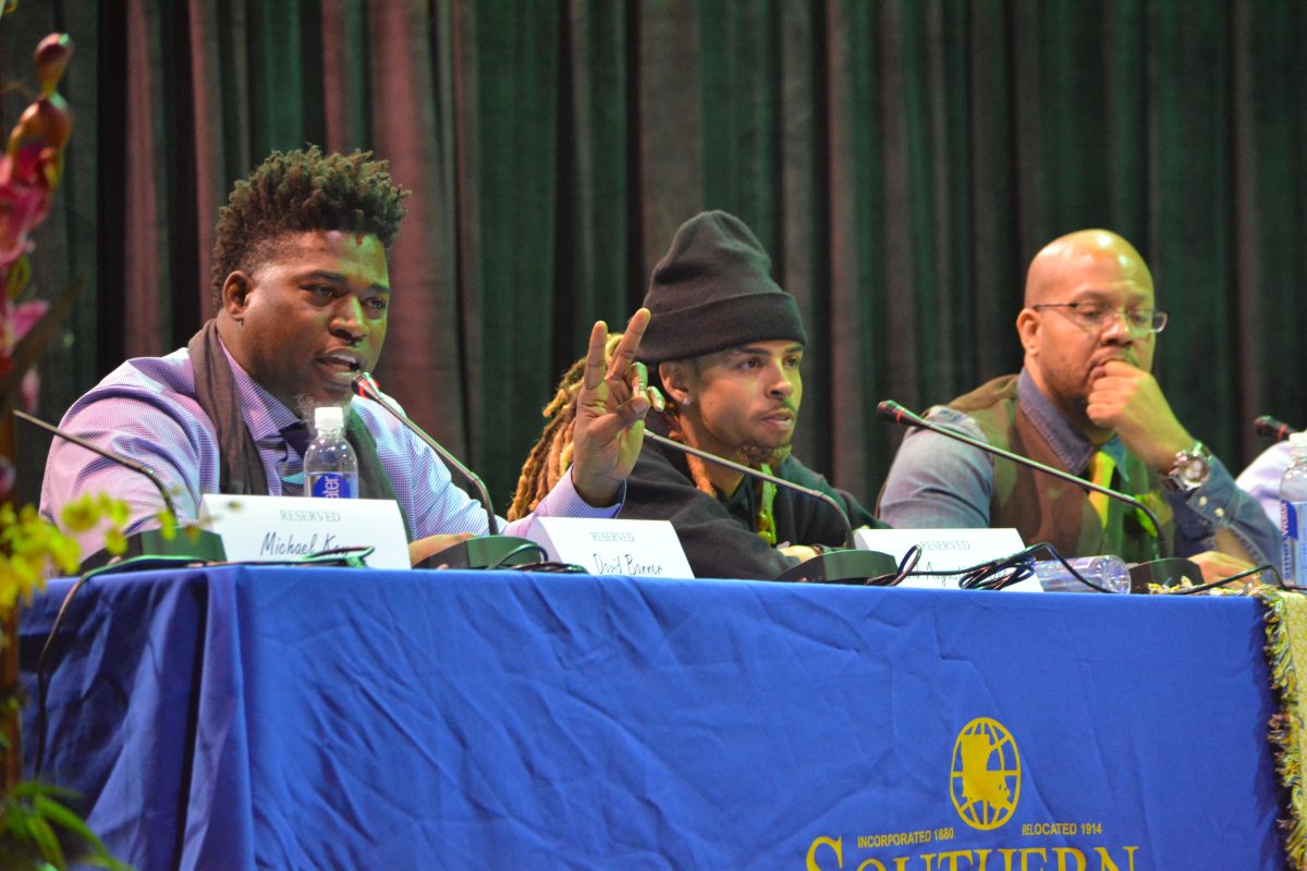 Southern University Alumni and rap artist David Banner speaks during the "Tanning of America" event in Seymour Gym, Sunday.