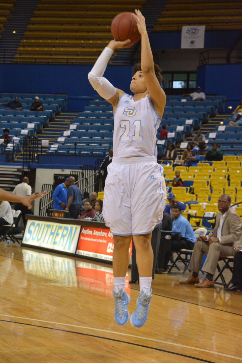 Britney Washington, Southern University Women's Basketball Guard, going for a 3 point shot during the Southern University A&amp;M vs. Alabama A&amp;M Women's Basketball game.