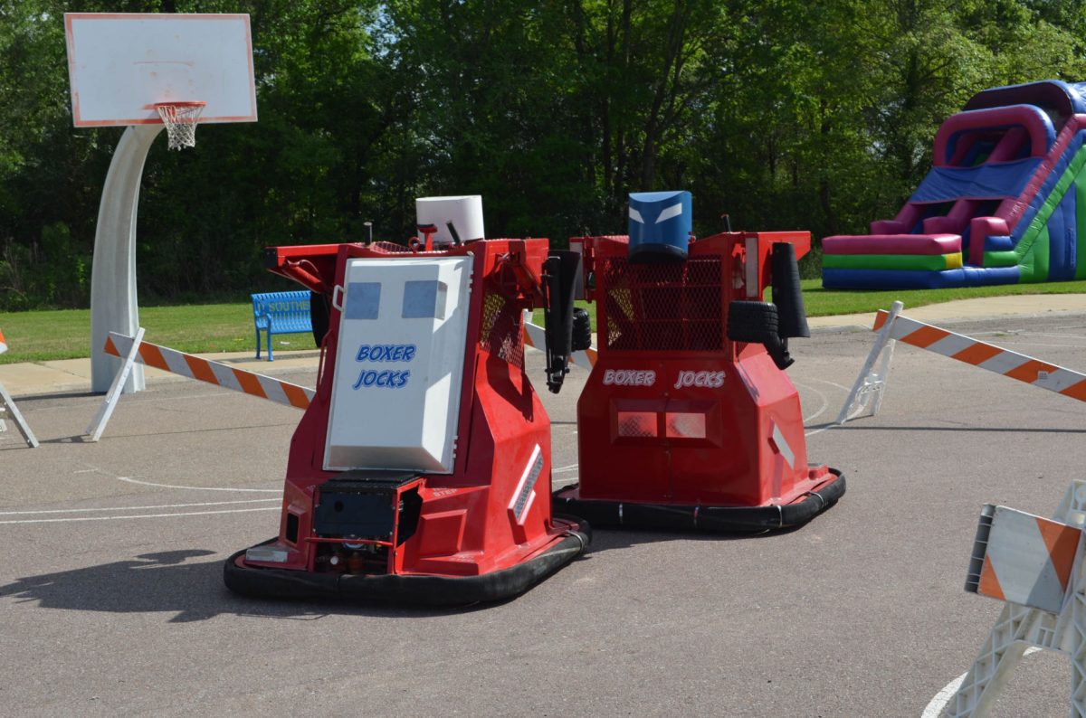 Students have fun in the boxer jocks robots for the Reslife Carnival