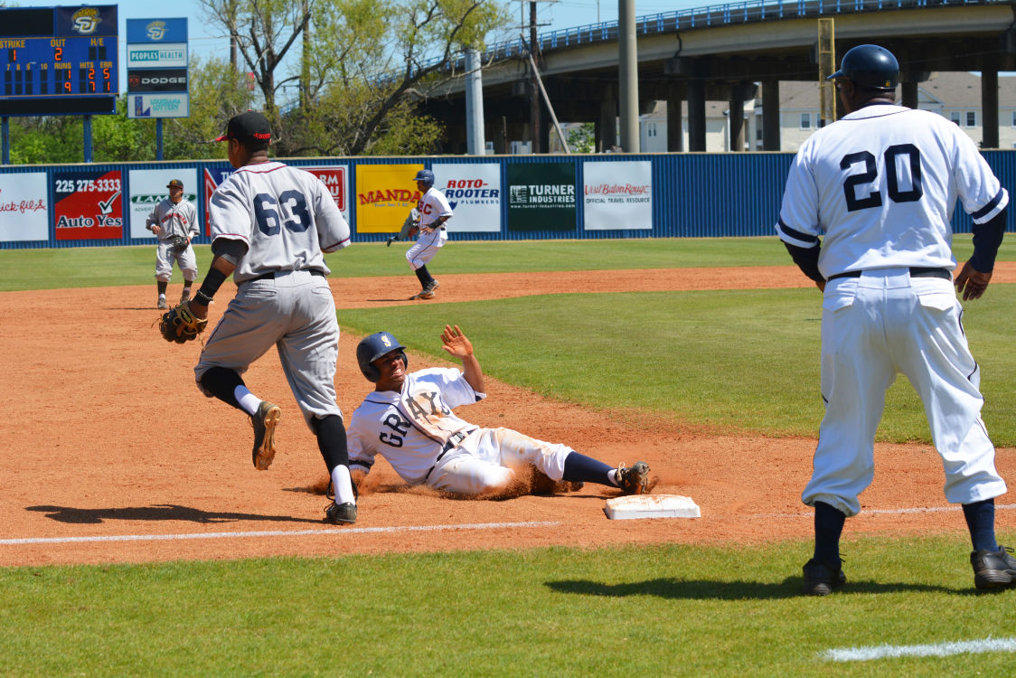 Senior third baseman Marcus Tomlin slides into to third base during game two against Grambling State University. The Jaguars completed their first three game sweep in the Southwestern Athletic Conference since 2003 on March 28 in Lee-Hines Field.