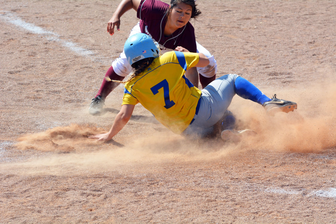 After an error from the plate, sophmore infielder Amanda Pacehco kicked it into high gear when as she slides safely into home plate and secures a point for the Lady Jaguars.