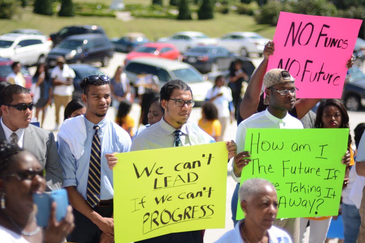 Southern University students protest pending higher education budget cuts on the steps of the Louisiana State Capitol.