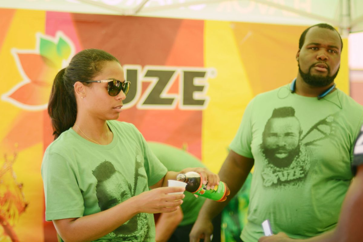 Street marketers for the Fuze Tea College Promotion hands out complimentary samples and bottled tea at the Smith-Brown Student Union.