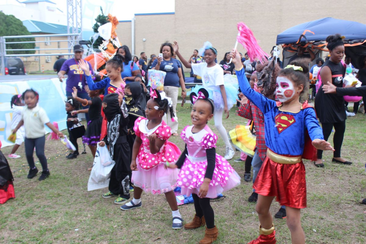 Children dance in their costumes during Boo at SU held by the Senior class.