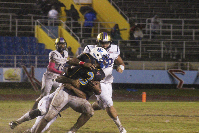 Running back Malcolm Crockett being brought down by Alcorn State defender during saturday&#8217;s game&#160; in A.W. Mumford Stadium.