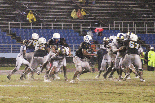 Southern University running back Lenard Tillery dashes pass an Alcorn State defender to extend the play during the game on Saturday, October 31. at A.W. Mumford.